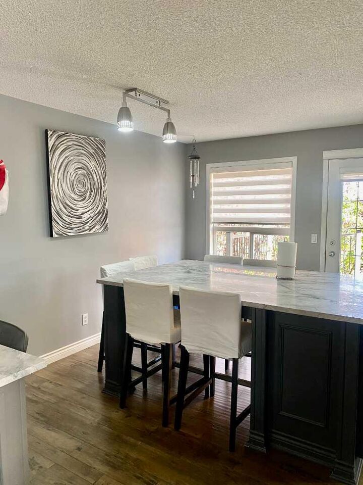 Property Photo: 205 Smallwood Street AB T9K 2J7