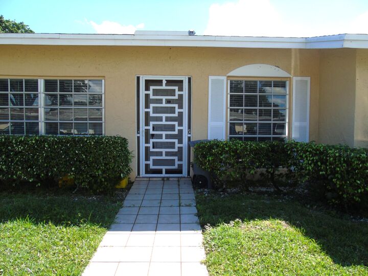 Property Photo: 13719 Flora Place C FL 33484