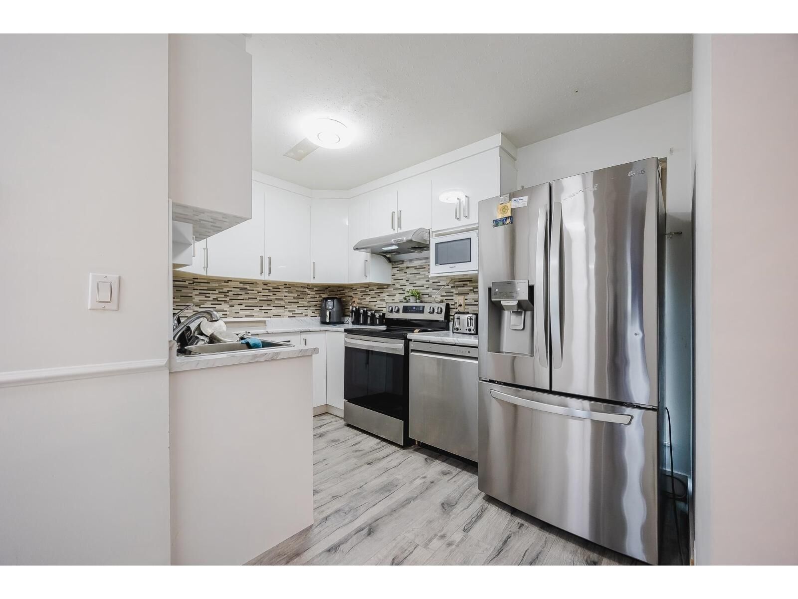 Photo de la propriété: 3075 Trethewey 14 BC V2T 3R4