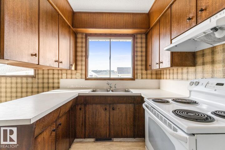 Property Photo:  14223 116 Street NW  AB T5X 1M9 