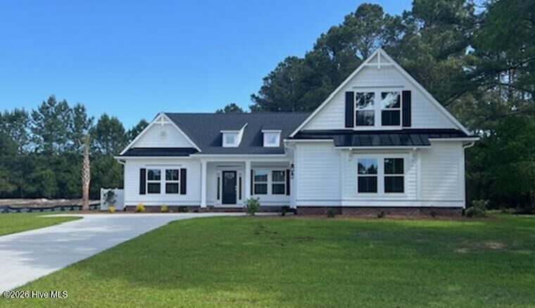Property Photo: 7490 Wallace Place SW 23 NC 28468