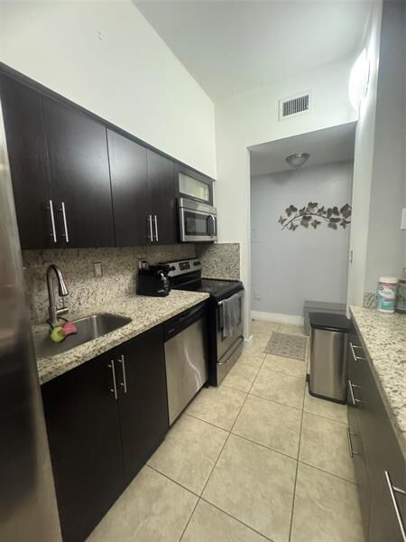 Property Photo:  7420 W 20th Ave 246  FL 33016