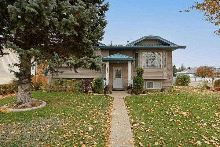 Property Photo: 144 Upland Boulevard AB T1R 0R3