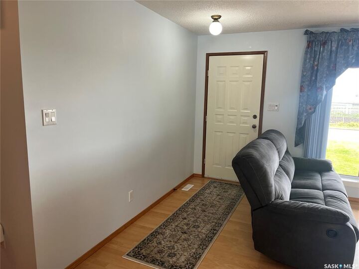 Property Photo: 206 4th Street NW SK S0A 4J0