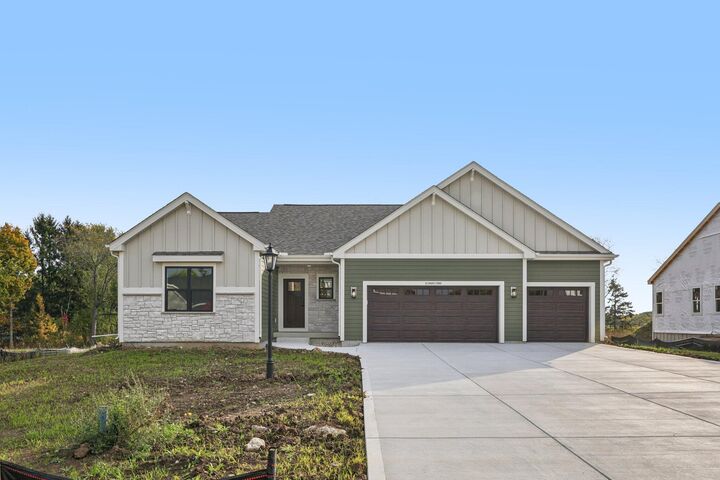 Property Photo: W149n11982 Red Holly Dr WI 53022