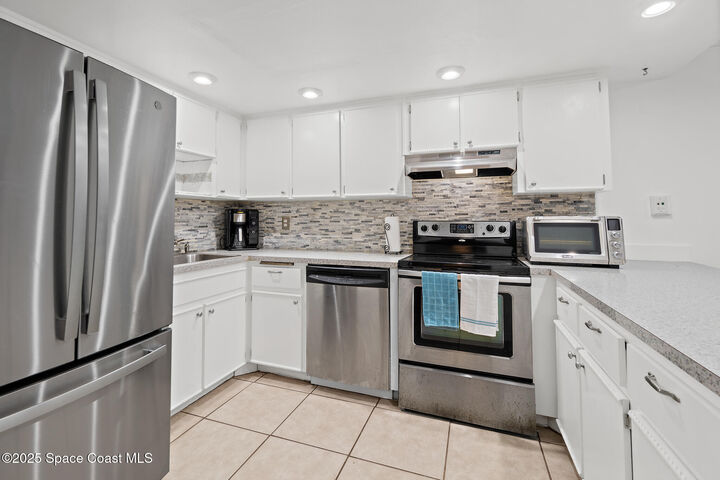 Property Photo: 8761 Cocoa Court FL 32920