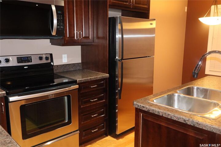 Property Photo: 33 Wood Lily Drive D2 SK S6J 1E4