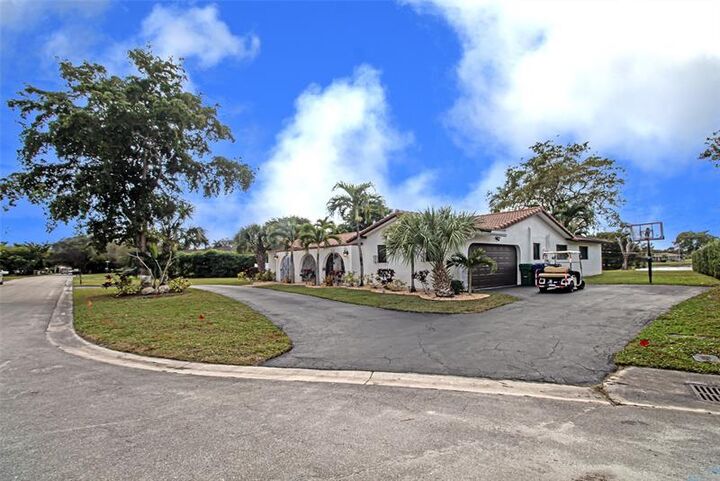 Property Photo:  11035 NW 26th Dr  FL 33065