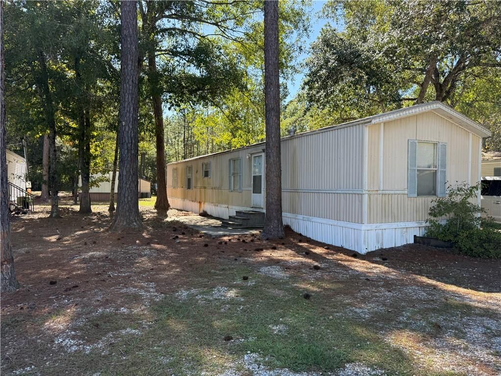 Property Photo:  64096 Mangano Road 158  LA 70452