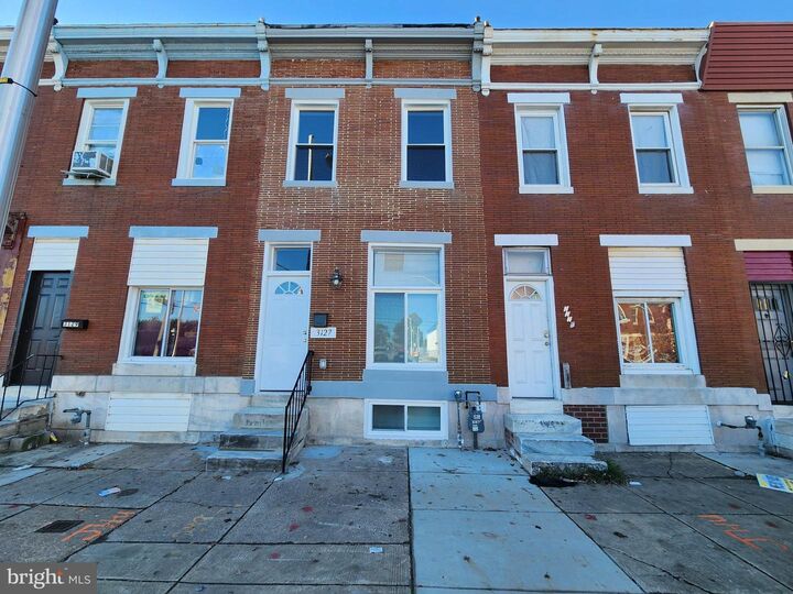 Property Photo:  3127 E Monument Street  MD 21205