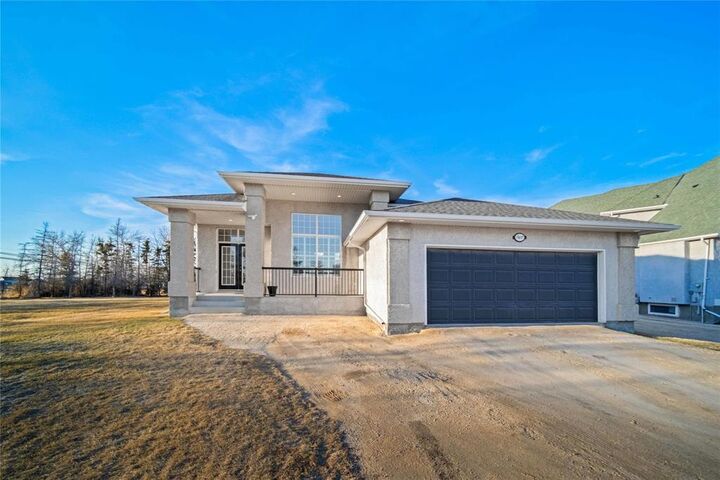 Property Photo:  2 River Springs Drive  MB R4A 2A3