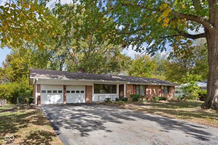Property Photo:  4210 Kessler Lane East Drive  IN 46220