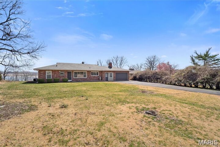 Property Photo:  9910 Parkway Drive  MO 63137