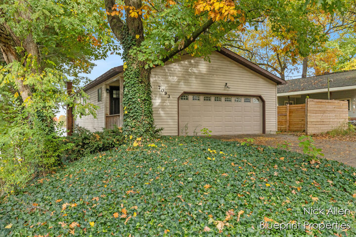 Property Photo:  7093 Peninsula Drive NE  MI 49341 