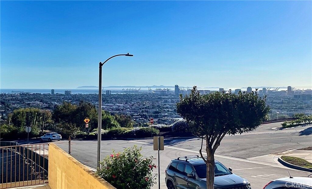 Property Photo:  2240 Stanley Ave 5  CA 90755