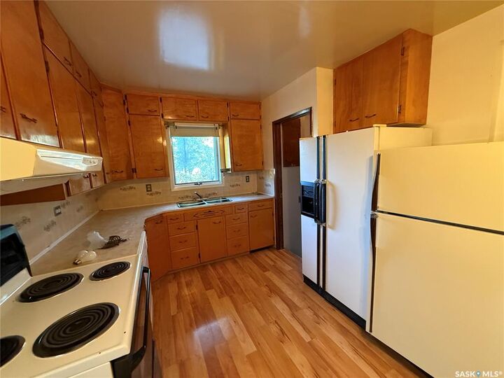 Property Photo: 211 Little Flower Avenue SK S0L 2V0