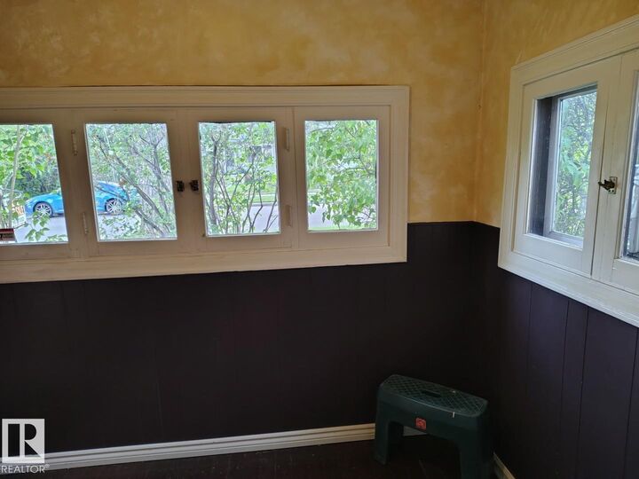 Property Photo:  11343 69 Street NW  AB T5B 1R8