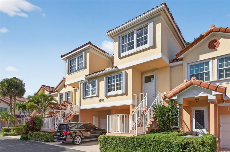 Property Photo:  1980 NE 7th St 104  FL 33441