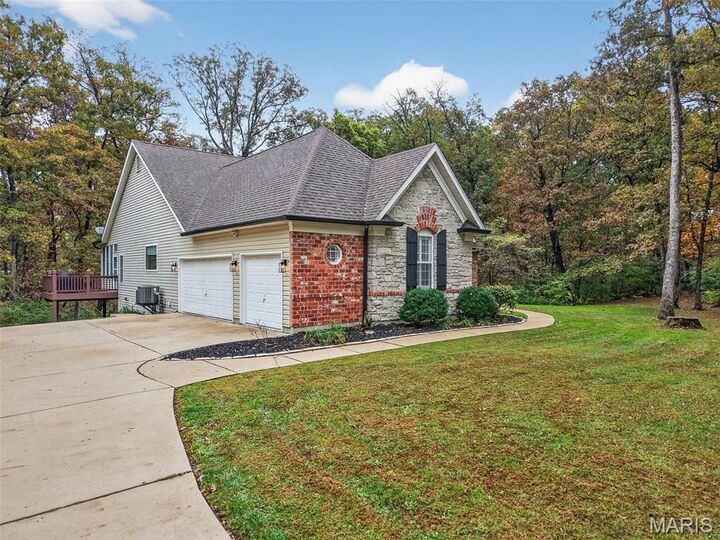 Property Photo:  1103 Ellerman Oaks Drive  MO 63348