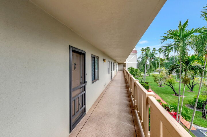 Property Photo:  14375 Strathmore Lane 305  FL 33446