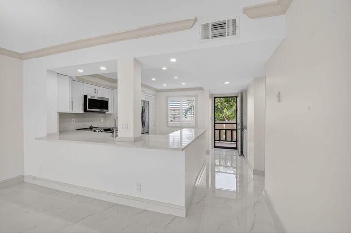 Property Photo:  14375 Strathmore Lane 305  FL 33446 