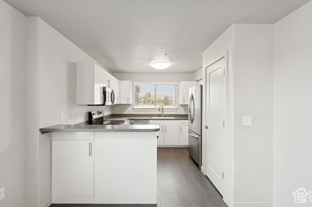 Property Photo:  1700 S Sandhill Rd C101  UT 84058 