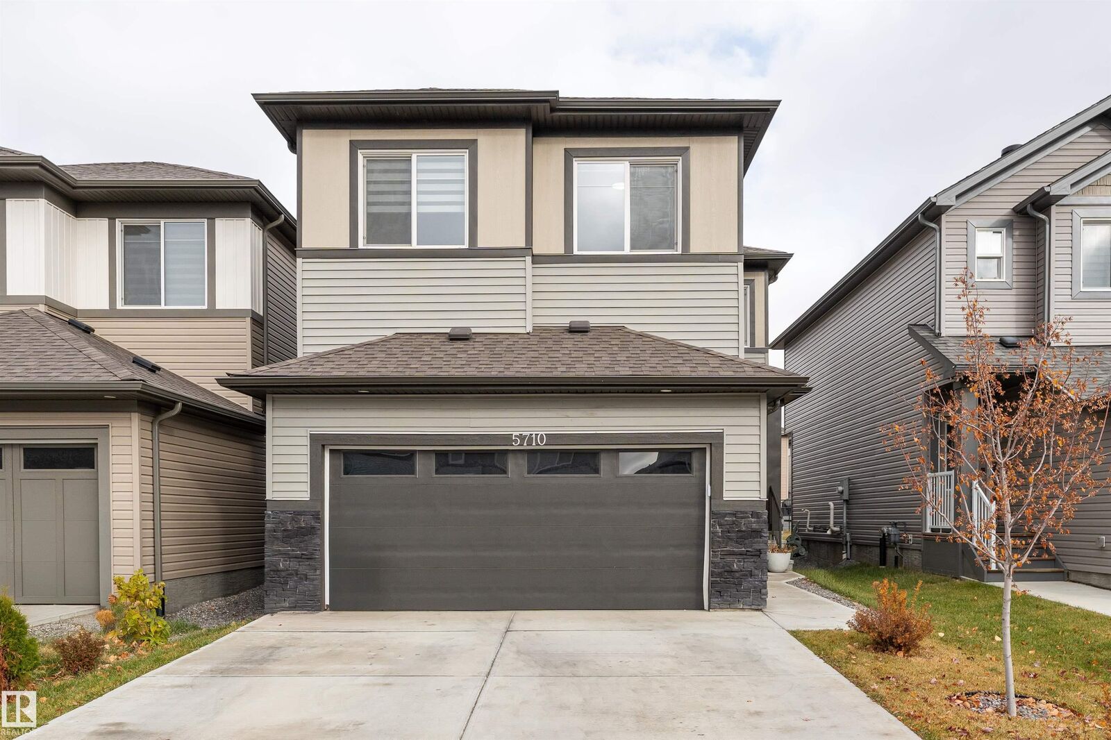 Property Photo: 5710 Cautley Crescent SW AB T6W 4X9