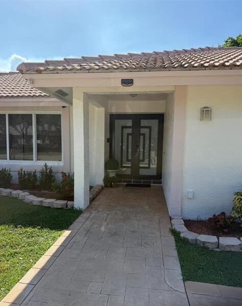 Property Photo:  402 NW 107th Ave  FL 33071 