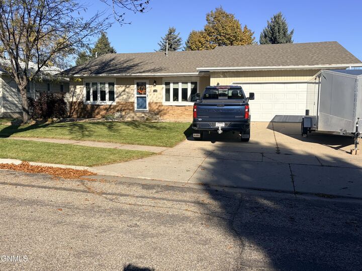 Property Photo:  118 Versailles Avenue  ND 58503