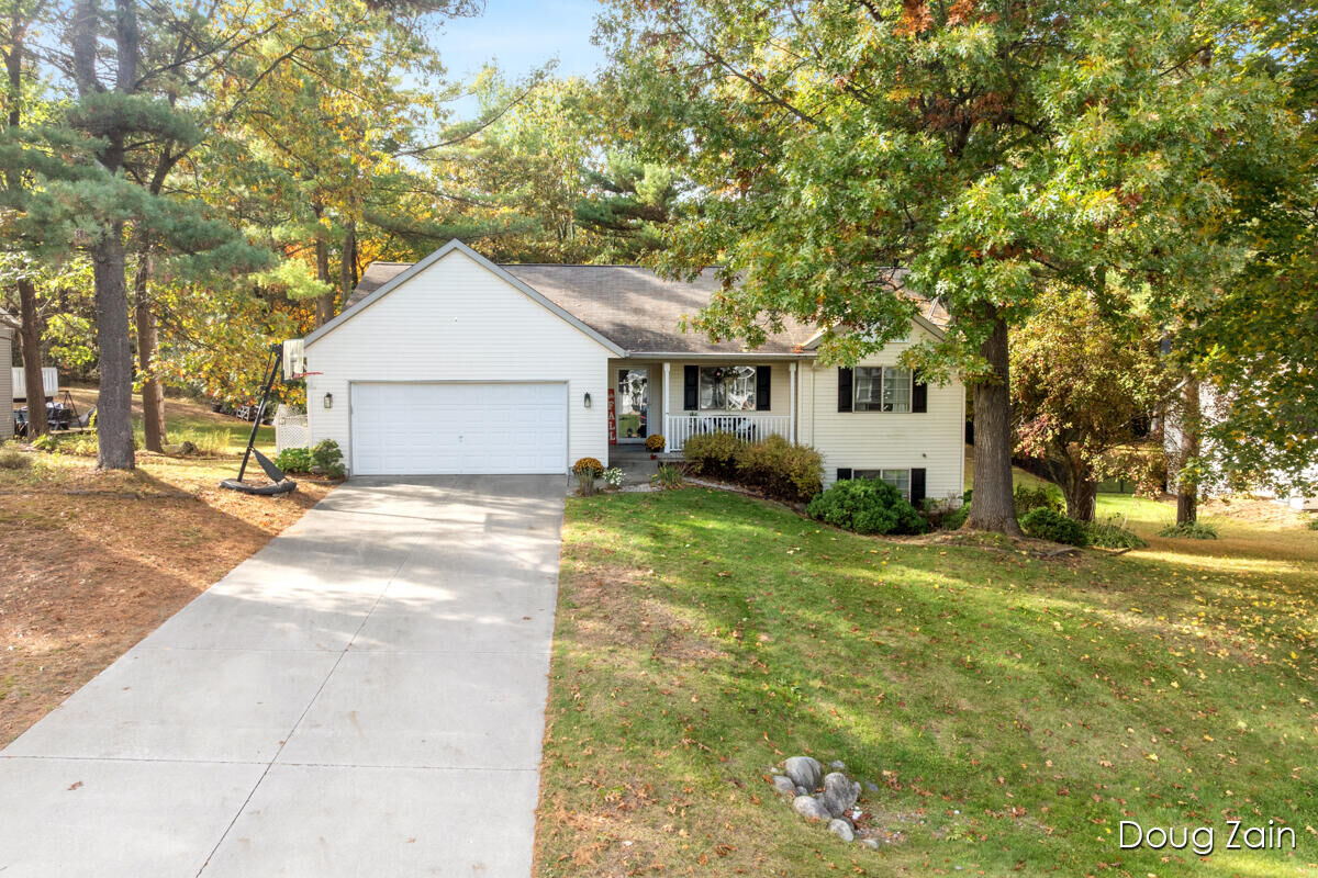Property Photo:  7282 Mid Timber Drive  MI 48838 