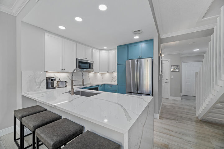 Property Photo:  11775 Saint Andrews Place 103  FL 33414 