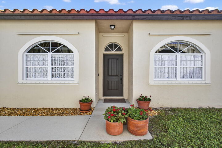 Property Photo:  2596 Country Golf Drive  FL 33414 