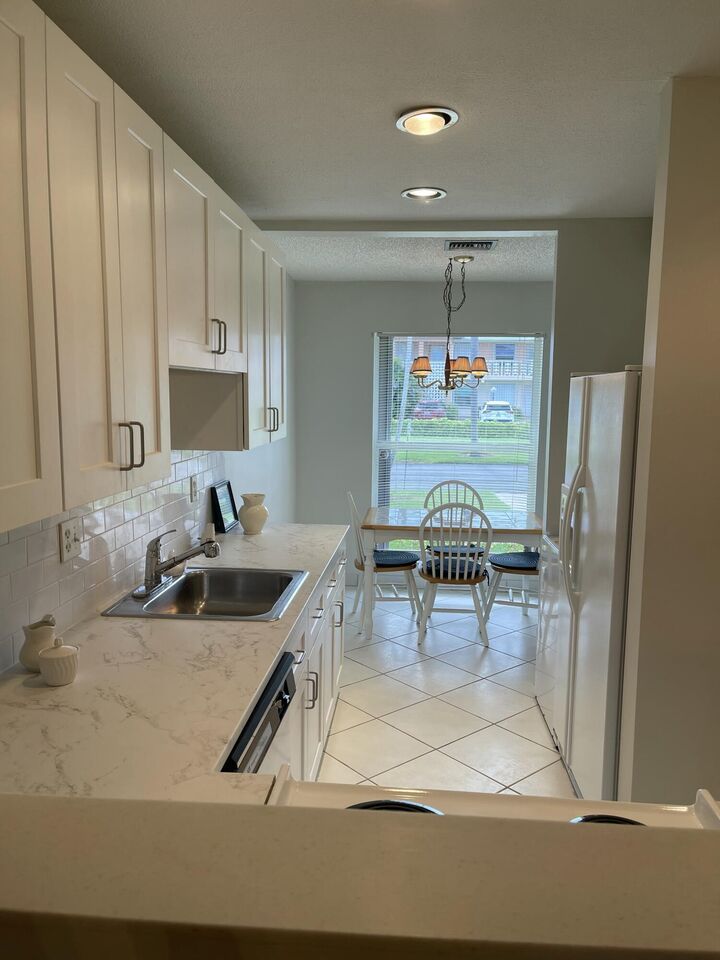 Property Photo:  1661 NW 20th Ave Avenue A-1  FL 33445