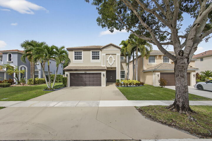 Property Photo: 9893 Woodworth Court FL 33414