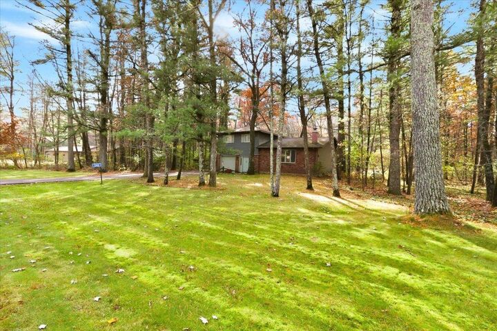 Property Photo:  5940 Pine Ridge Trail  WI 54494 