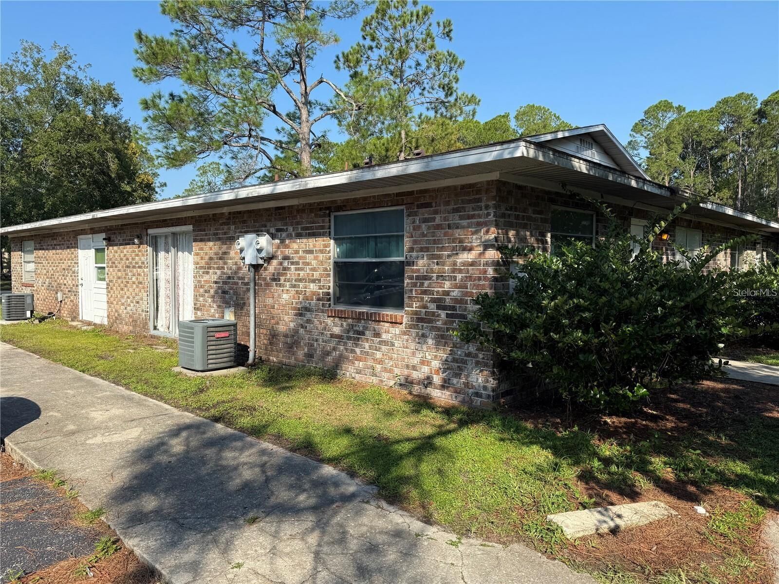 Property Photo: 5811 NW 23rd Terrace A, B, C, D FL 32653