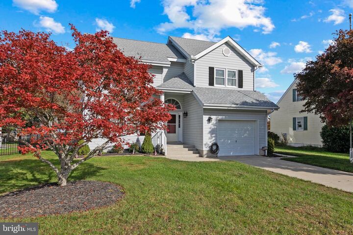 Property Photo: 37711 E Pond Circle DE 19975