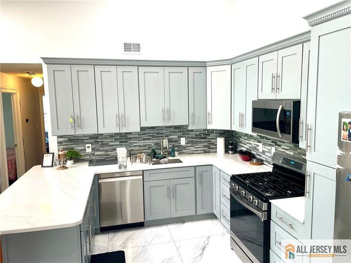 Property Photo: 341 Wimbeldon Court NJ 08902