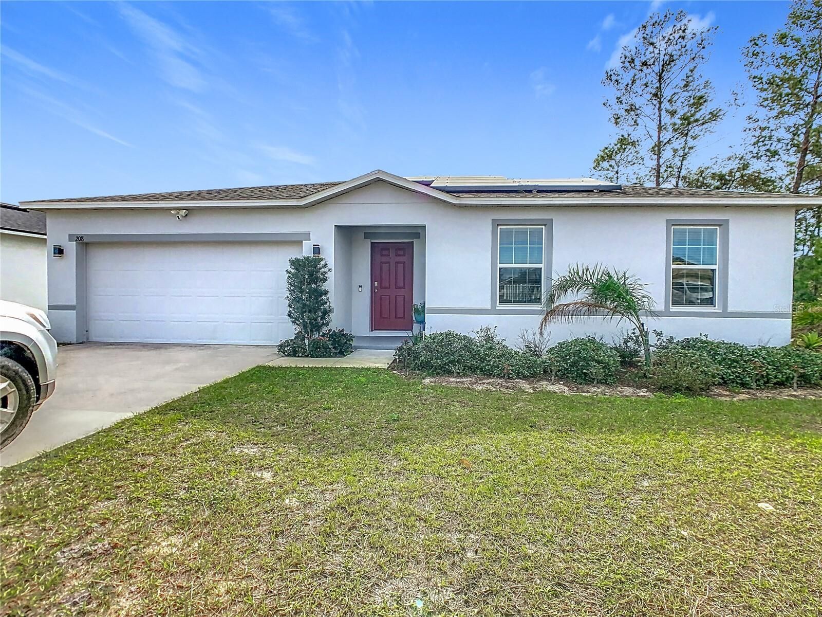 Property Photo: 208 Goldenrod Lane FL 34759