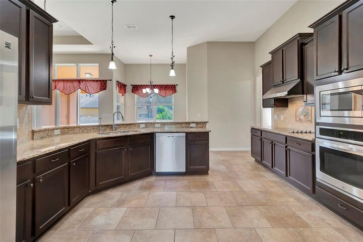Property Photo:  10816 Wyandotte Drive  FL 34711 