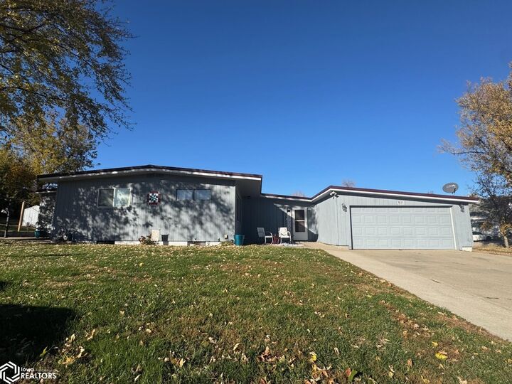 Property Photo:  511 E 8th Street  IA 52339 