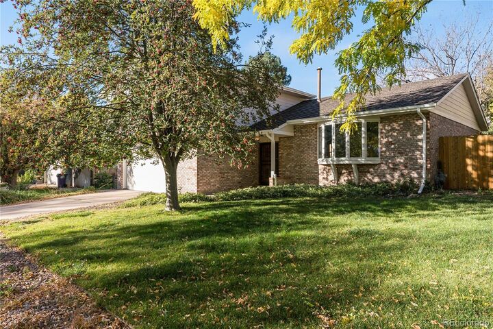 Property Photo: 4661 S Wolff Street CO 80236