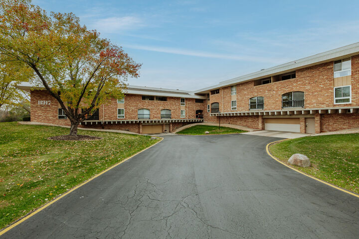 Property Photo:  11917 W Appleton Ave 6  WI 53224 
