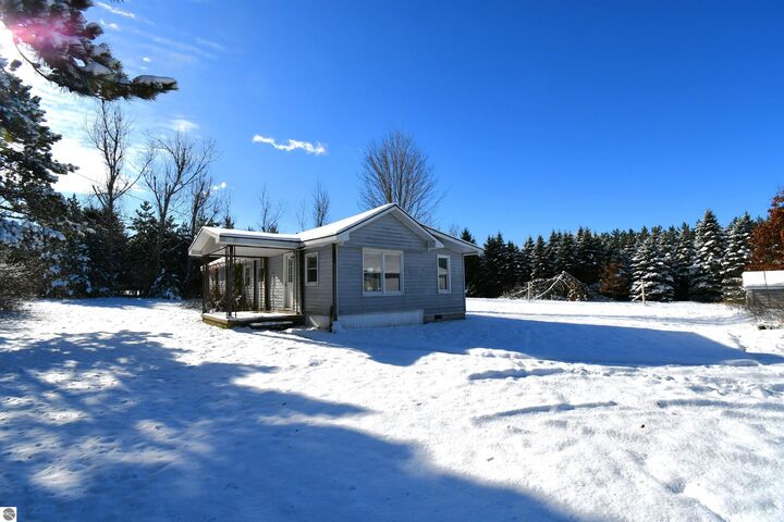 Property Photo:  8324 Miller  MI 49706 