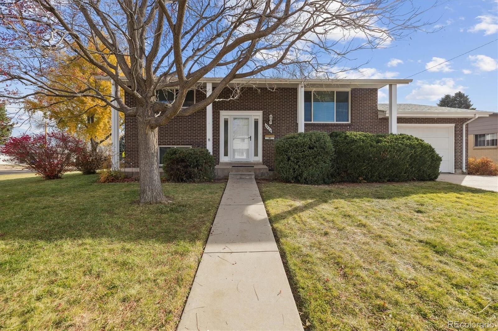 Property Photo:  4480 S Tennyson Street  CO 80236 