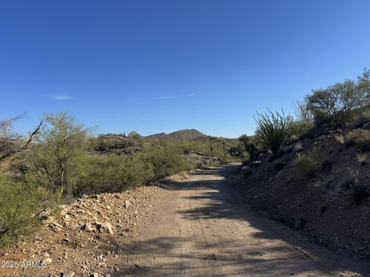 Property Photo:  Xx00h S Blue Tank Trail -  AZ 85390 