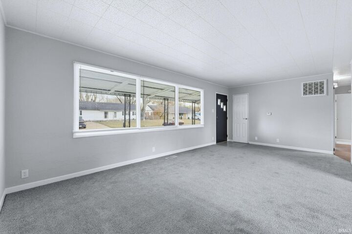 Property Photo: 1208 Braeburn Drive IN 46774