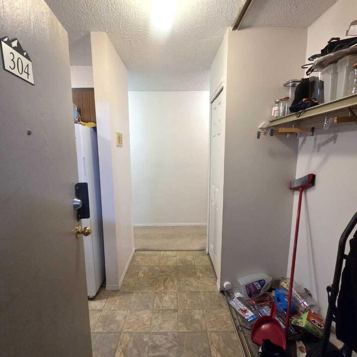 Property Photo:  5611 9 Avenue 304B  AB T7E 1R5 