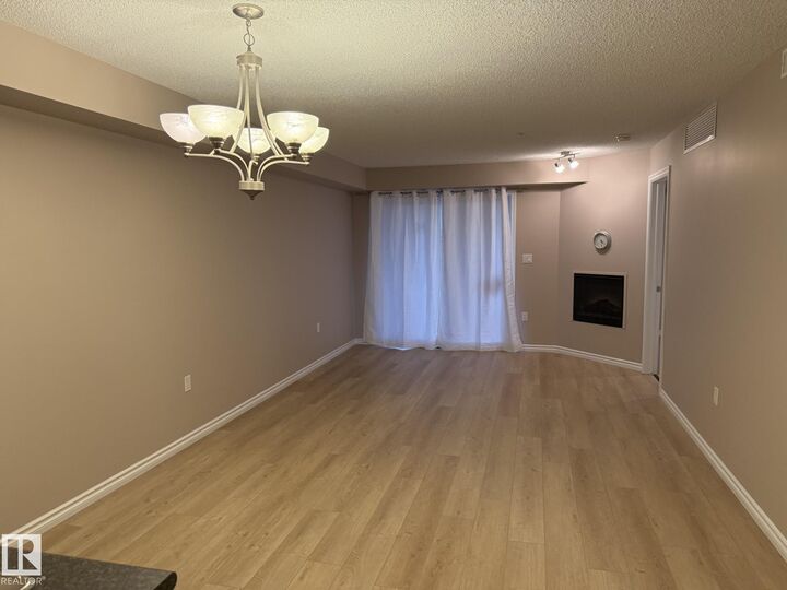 Property Photo: 10118 106 Avenue NW 303 AB T5H 0B8