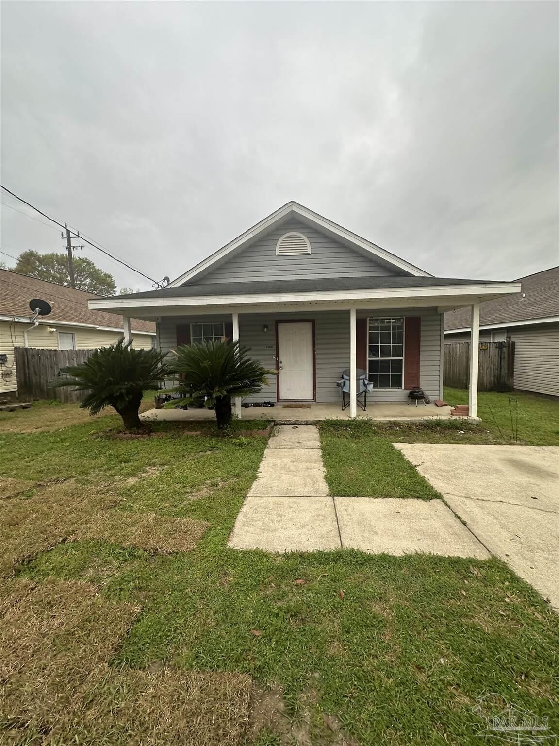 Property Photo:  8405 Fowler Ave  FL 32534 